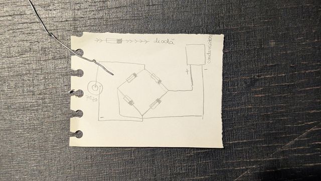 Hand-drawn schematic showing a diode bridge rectifier circuit designed to convert sensor signals into piezoelectric energy