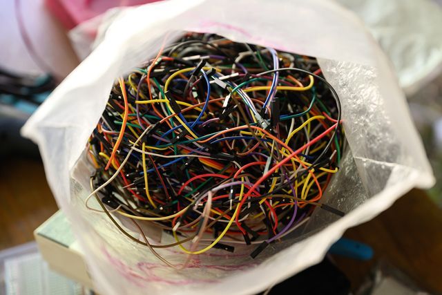 Big bag of jumper wires, Dupont wires and components for circuit prototyping, in need of sorting. Photo Katja Goliat